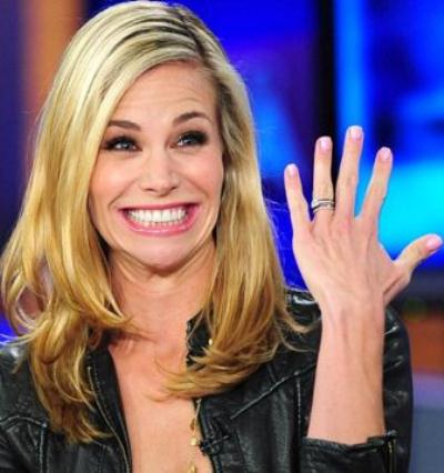 Baywatch babe Brooke Burns is engaged and showing off her solitaire