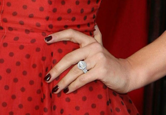 The Black Swan actress and longtime fianc flashed wedding rings designed by